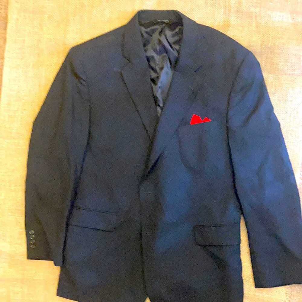 Joseph A Bank blazer with red pocket square.
